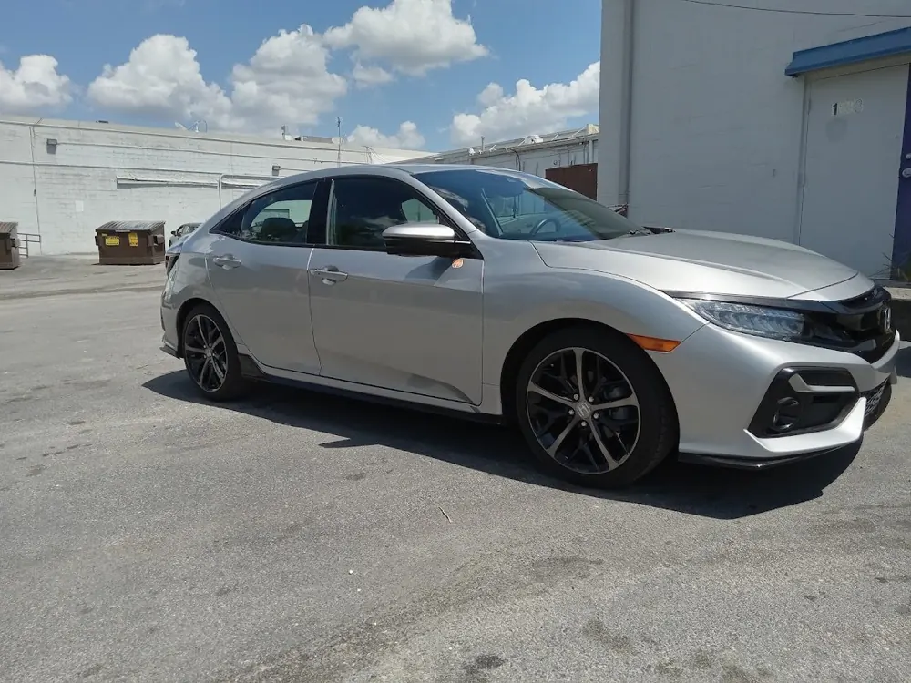 Silver Honda Civic hatchback, front three-quarter view
