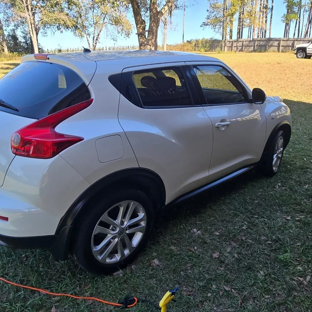 White Nissan Juke, rear three-quarter